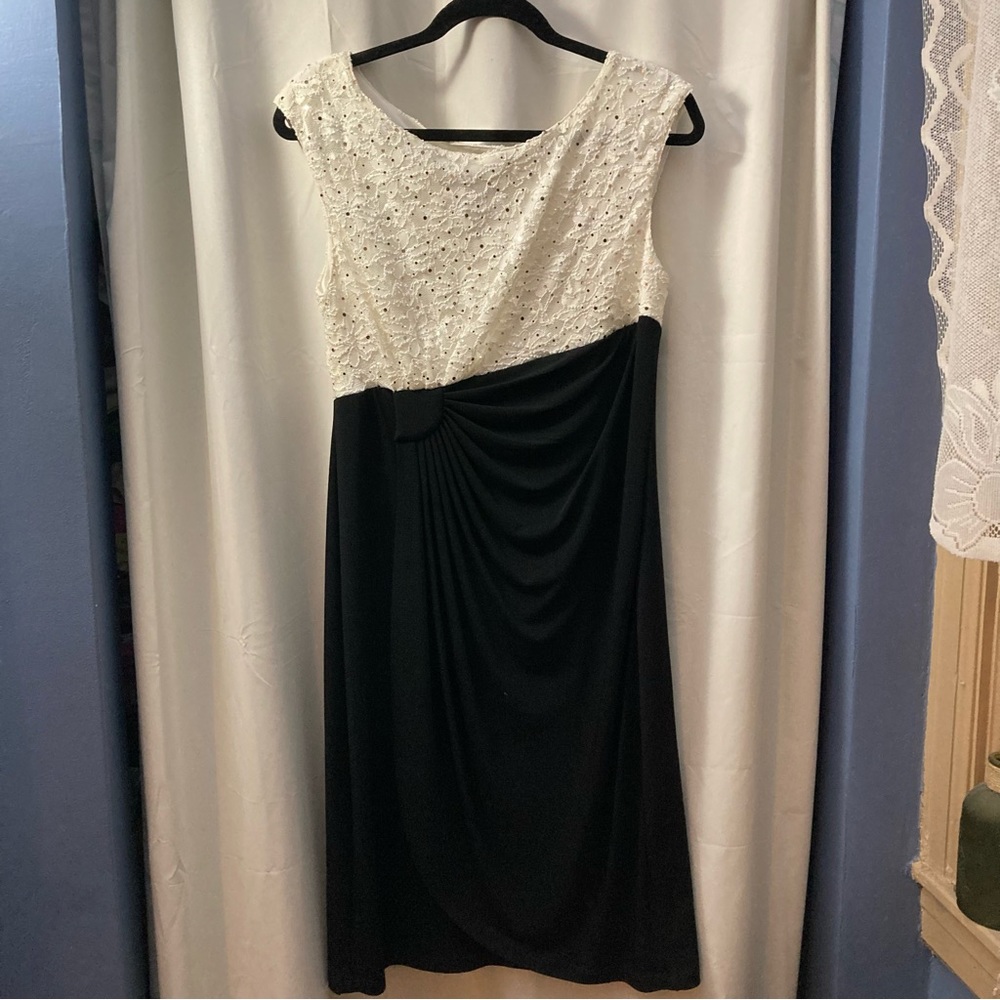 A Black and White Dress with pleats